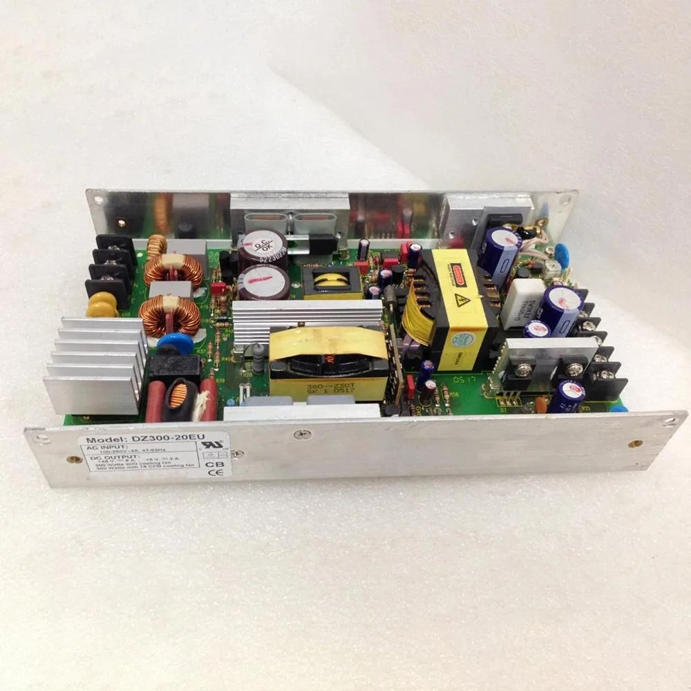 Rectangular silver ATX power supply unit with ventilation grille and cable bundle
