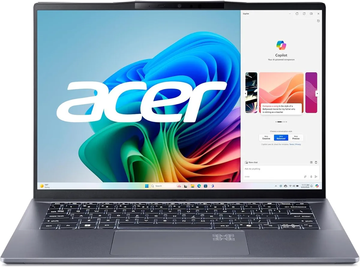 Silver-grey 14.5 inch laptop with thin bezels and backlit keyboard