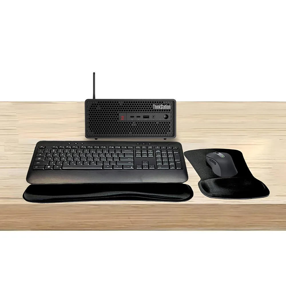 Small silver desktop tower with wireless keyboard mouse gel pad and wifi adapter
