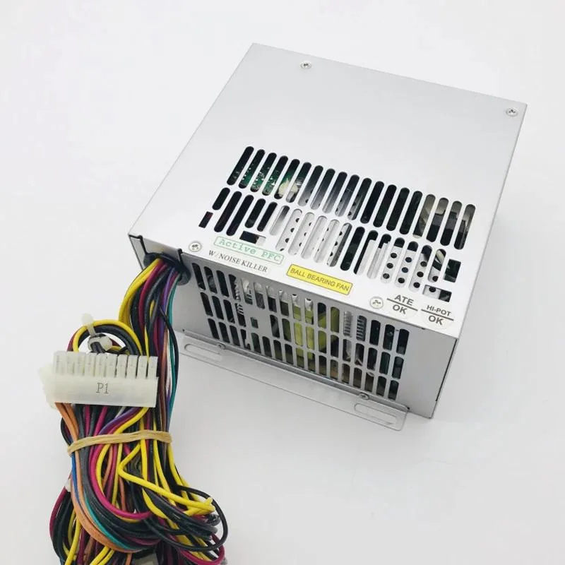 A standard ATX power supply unit in a matte black metal enclosure with a rear exhaust fan and side label visible