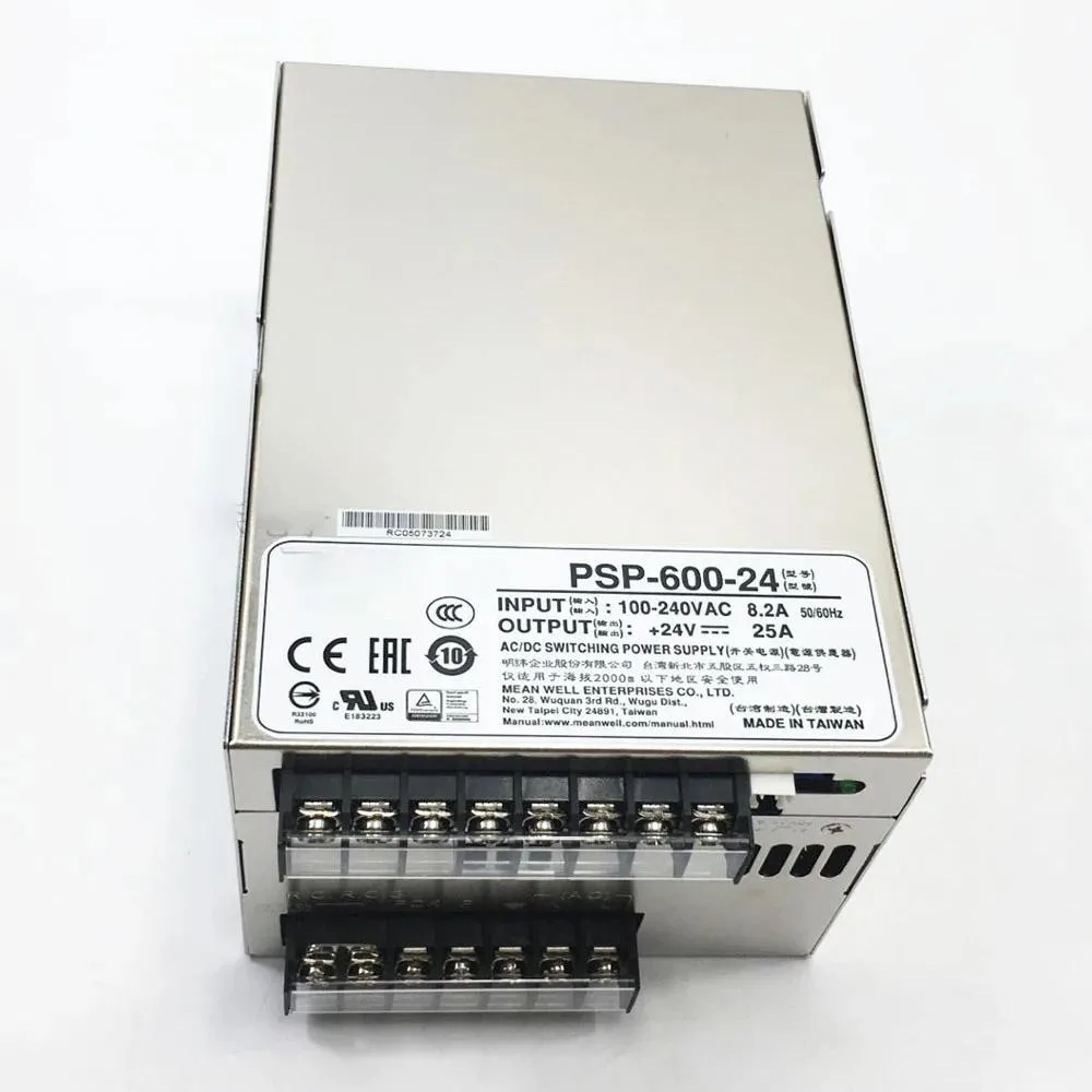 Rectangular metal power supply unit with ventilation grilles and terminal connections