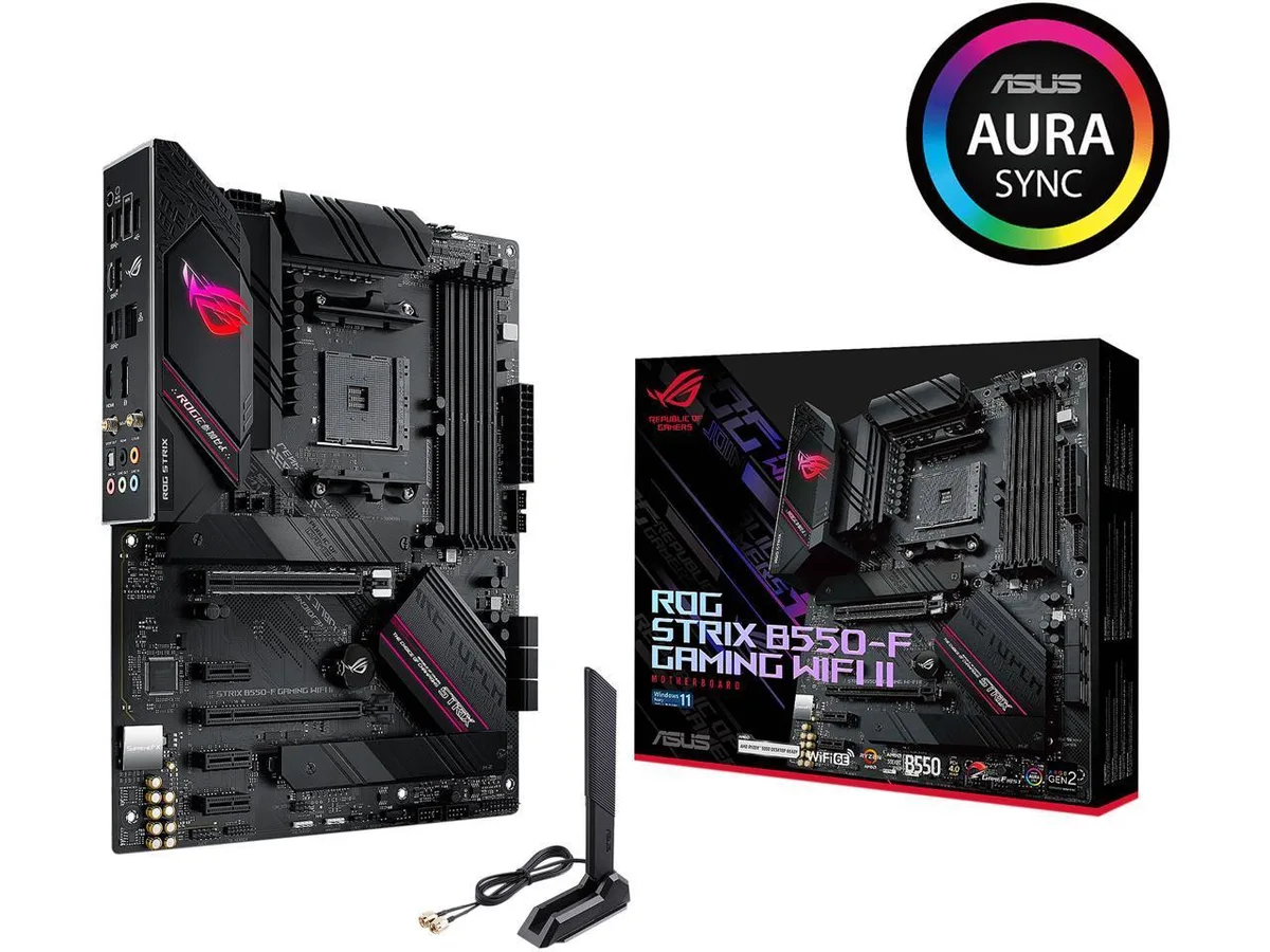 ATX motherboard in dark grey with silver heatsinks and RGB lighting accents