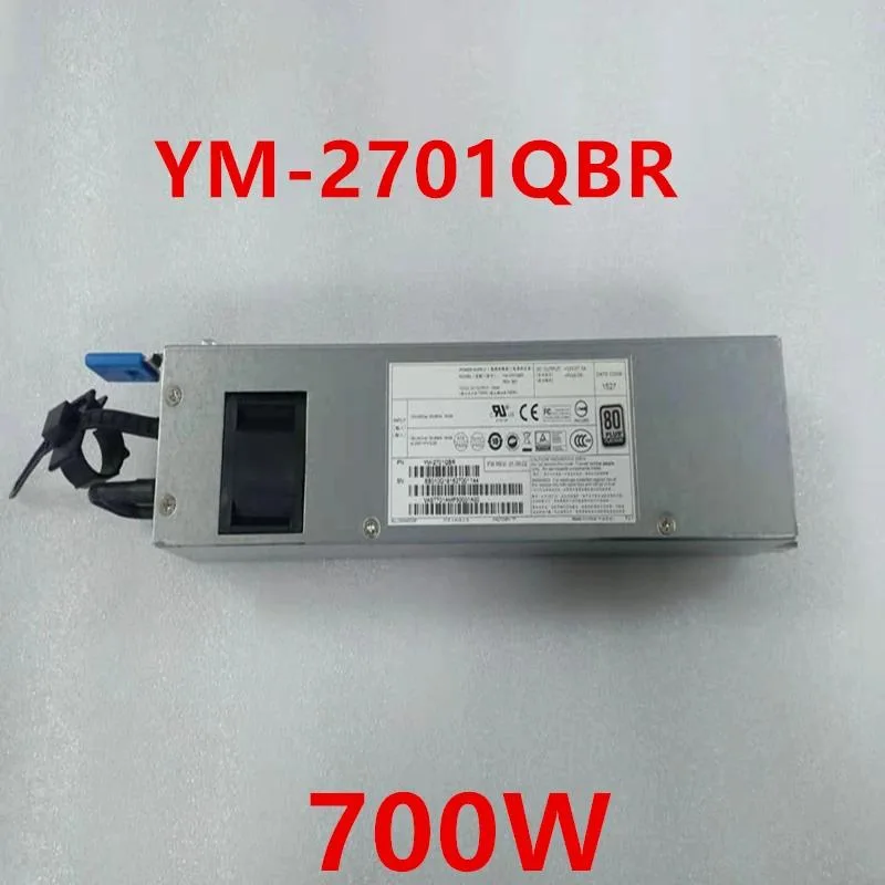 Rectangular metal power supply unit with fan grille and modular cable sockets