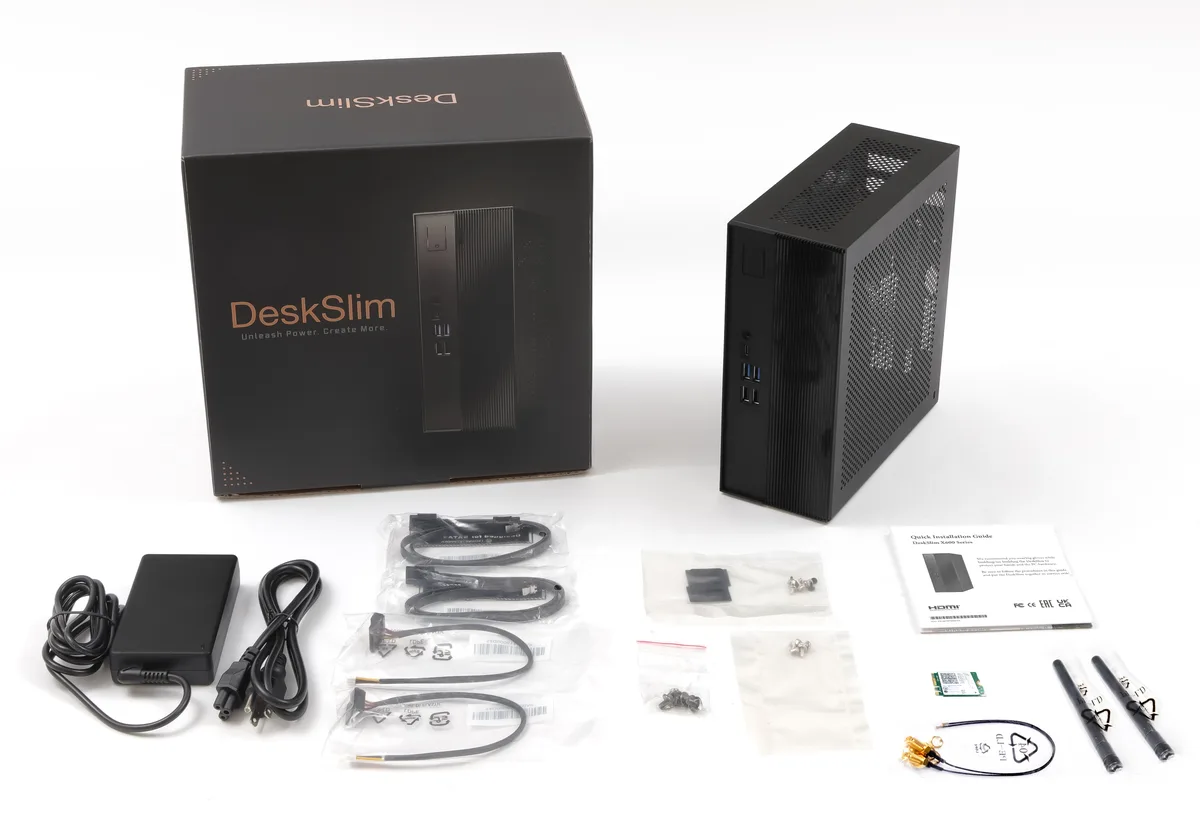 Black rectangular mini PC barebone, slim chassis, front USB-C and Type-A ports, rear HDMI and DisplayPort