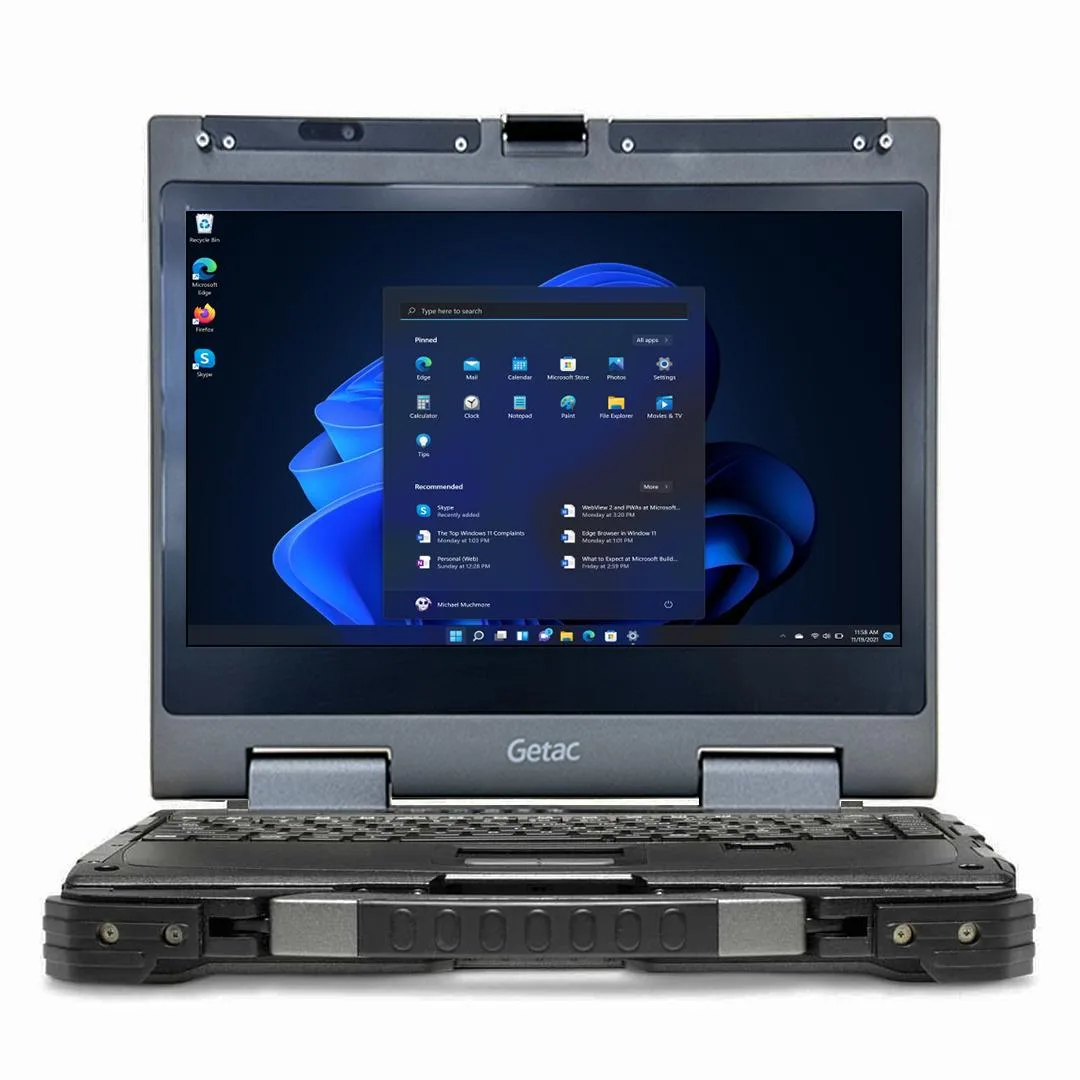 Thick black and grey rugged laptop with 13.3 inch touchscreen, backlit keyboard and multiple ports