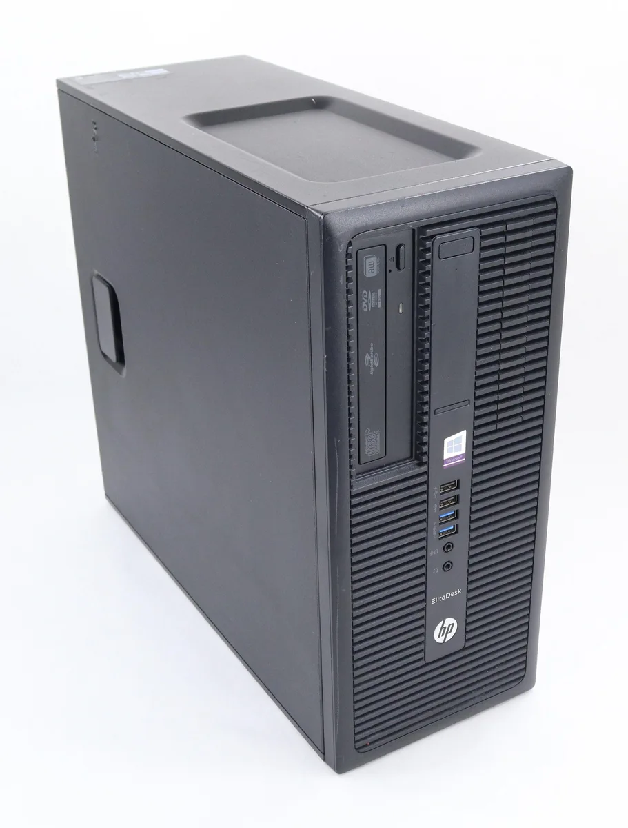 Black rectangular tower PC with front optical drive slot and USB ports