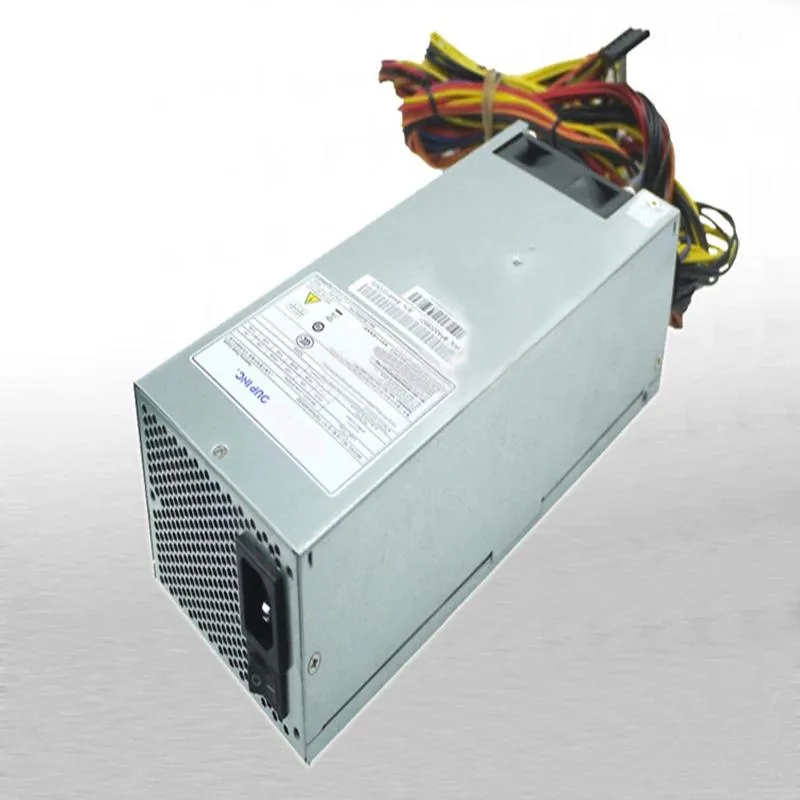 Rectangular silver ATX power supply unit with gold certification badge and cooling fan grille