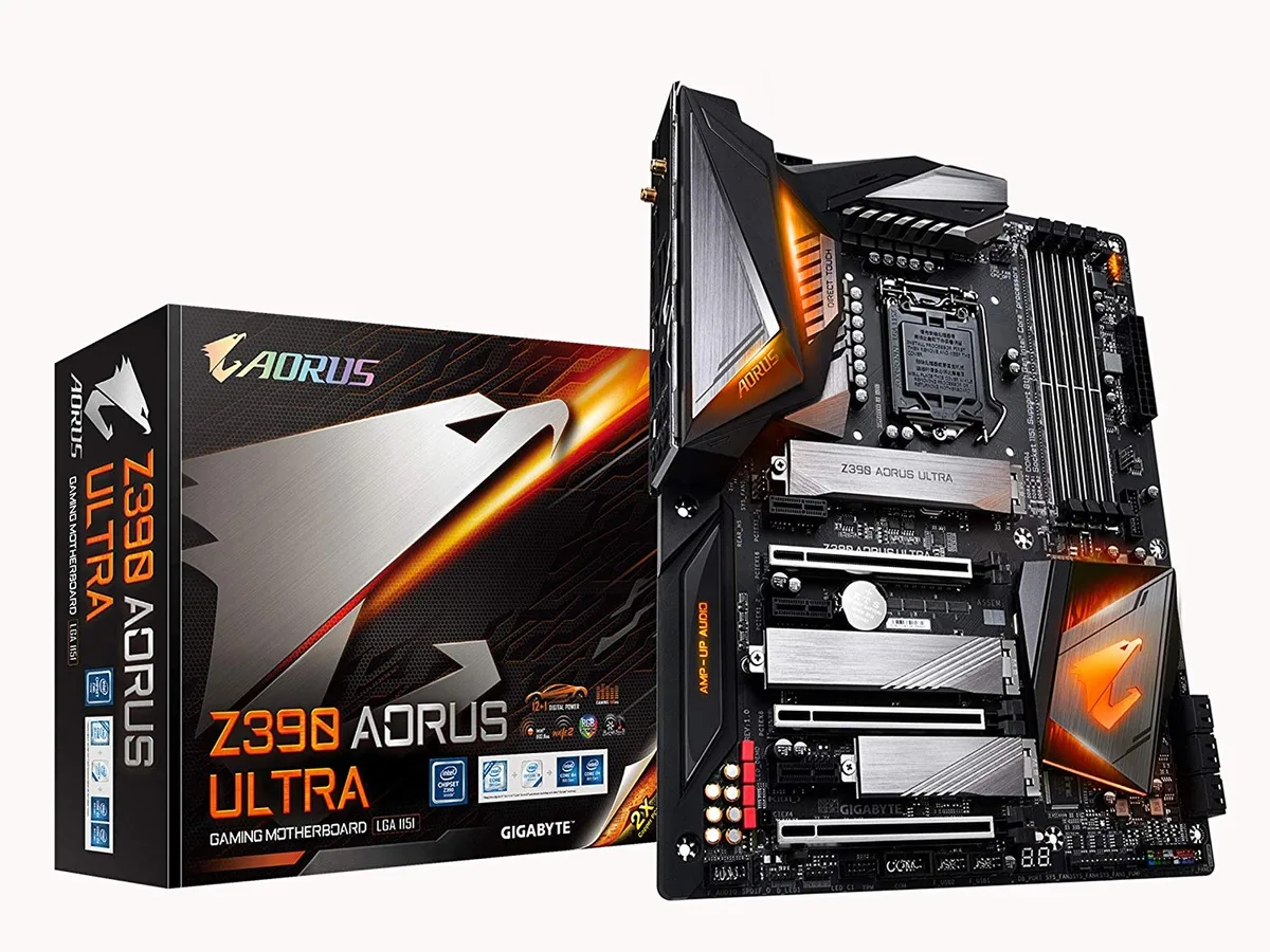 ATX motherboard, dark PCB with silver heatsinks and RGB lighting