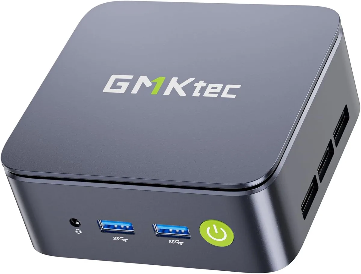 Small black cube mini PC with matte finish