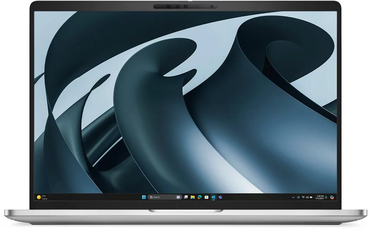 Silver aluminum 16 inch laptop closed on light background