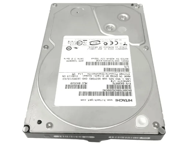 Silver 3.5 inch bare hard drive with exposed circuit board