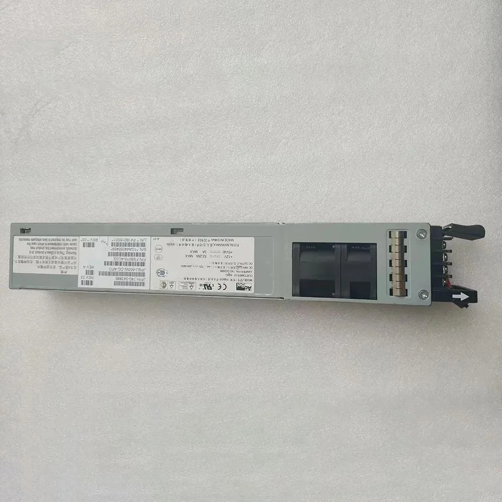 Silver ATX power supply unit with fan grille and cable bundle