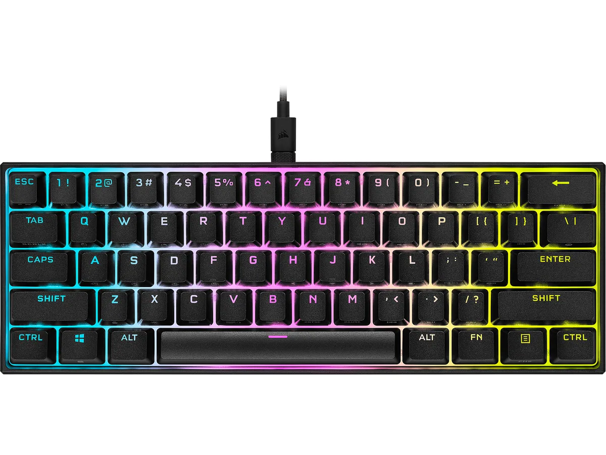Compact black 60% mechanical keyboard with per-key RGB lighting and detachable USB-C cable