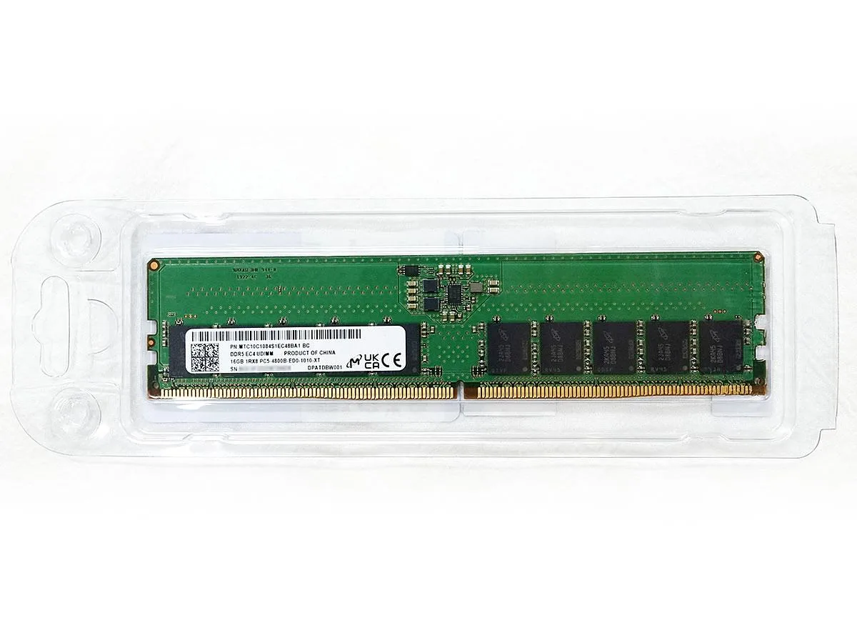 Green rectangular DDR5 memory module with gold contacts and black chips on both sides