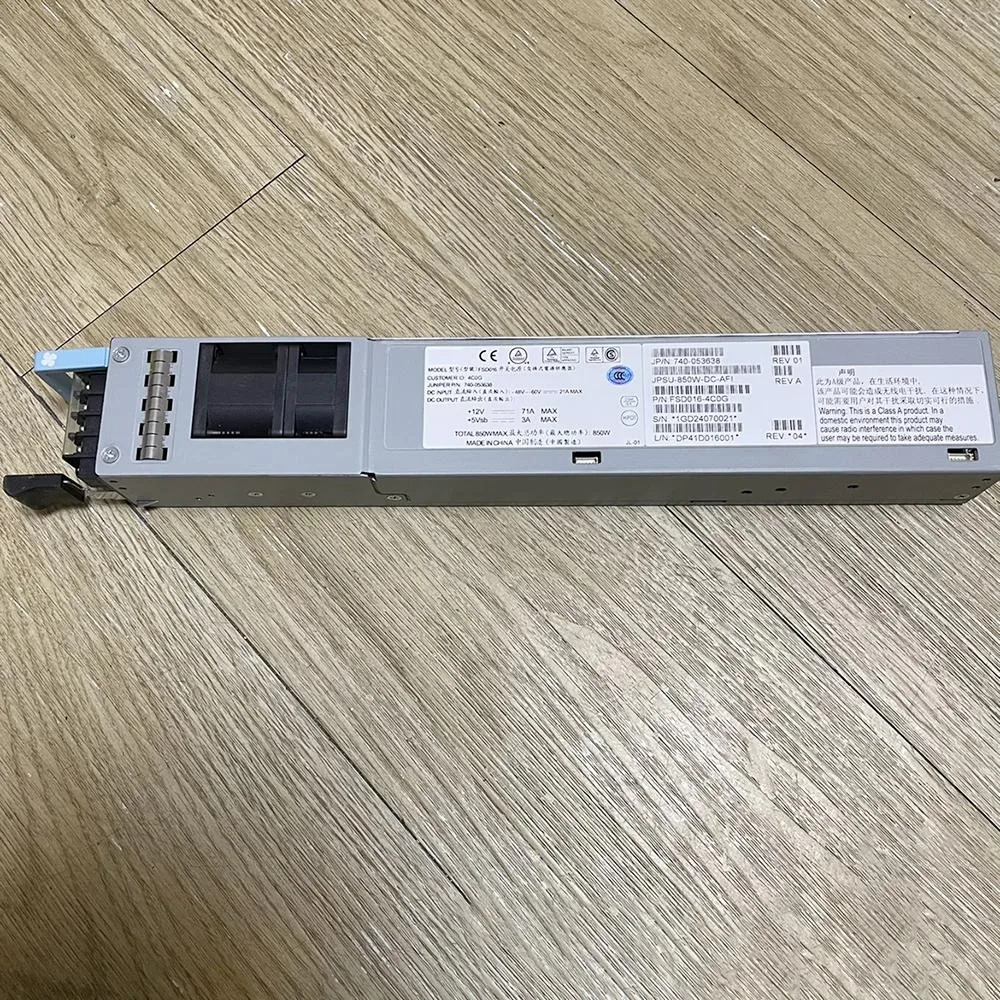Rectangular silver metal power supply unit with rear fan grille and side label