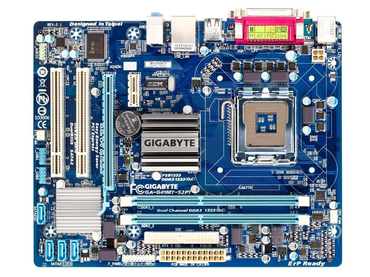 Green micro ATX motherboard with silver LGA 775 socket, two DDR3 slots, blue PCIe x16 and white PCI slots, black rear I/O panel
