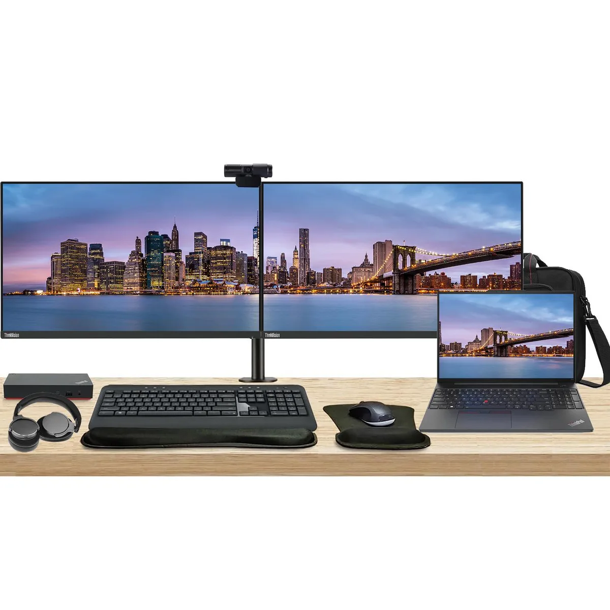 Lenovo ThinkPad E16 laptop with dual 24 inch monitors on a desk stand, keyboard, mouse, webcam, headphones and briefcase