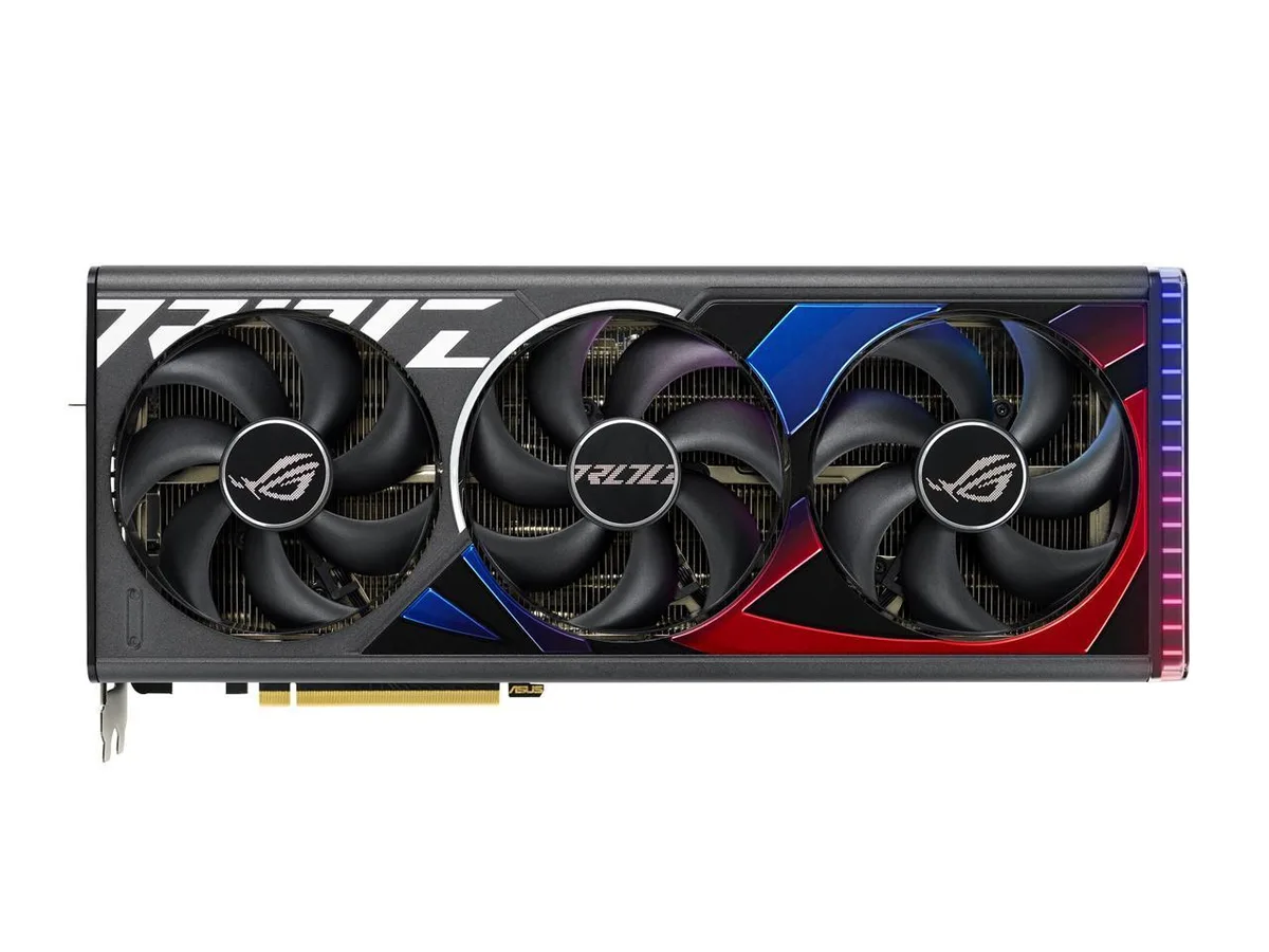 Triple-fan ROG Strix graphics card in dark matte finish with RGB lighting accents