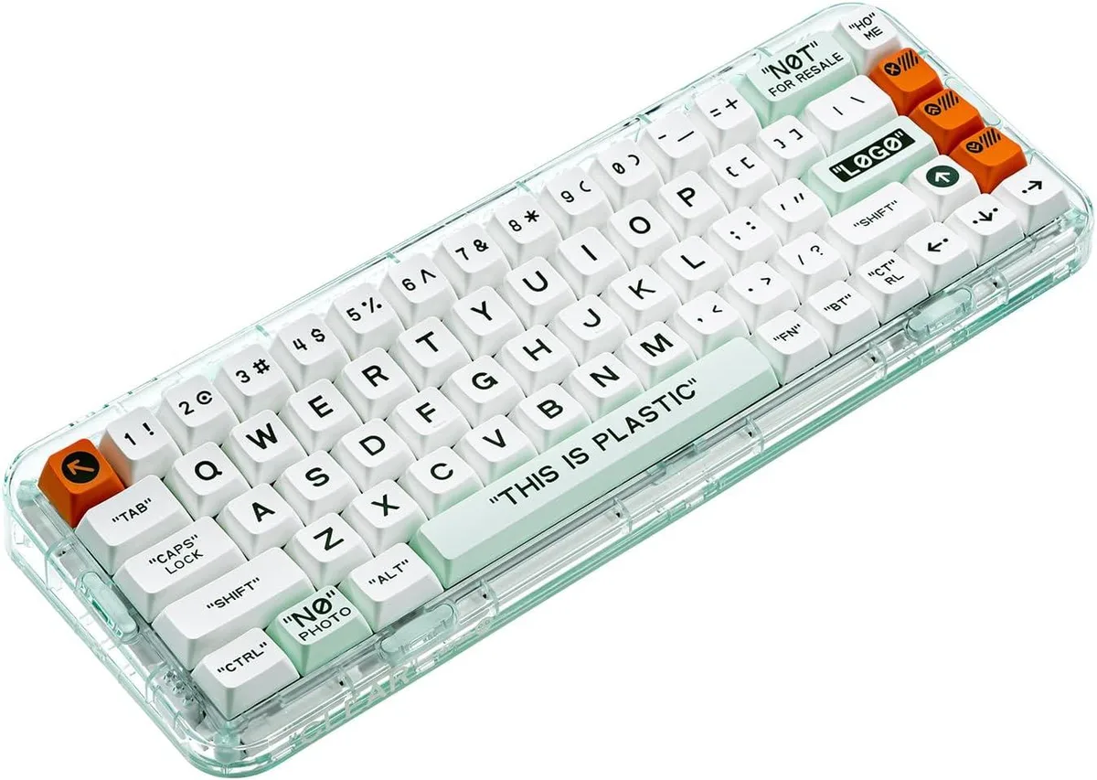 White 65% wireless keyboard with transparent case and black keycaps, 68 keys, arrow cluster visible