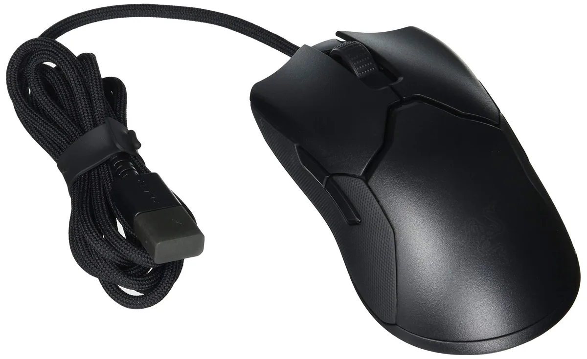 Black ambidextrous wired gaming mouse with RGB lighting and textured side grips