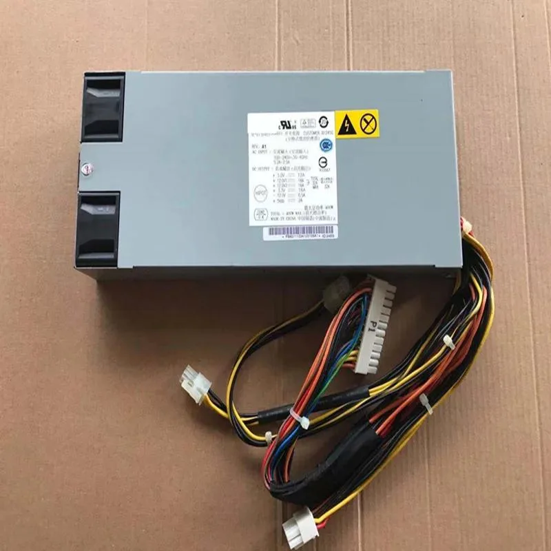 Silver 1U ATX power supply with rear fan grille and modular cable sockets