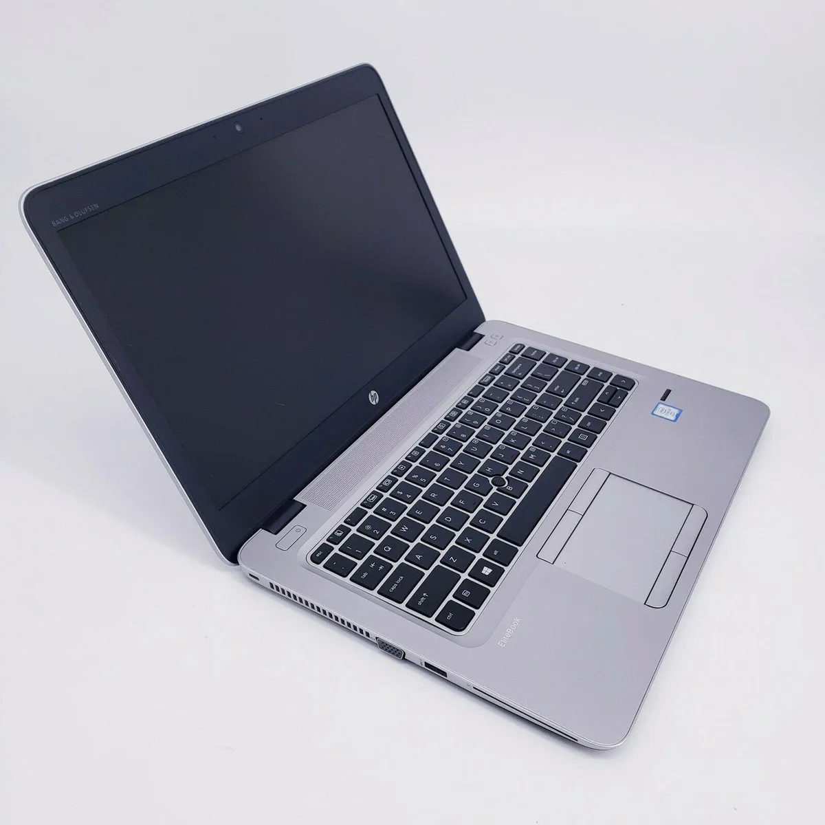 Silver 14 inch business laptop closed showing matte finish and HP branding