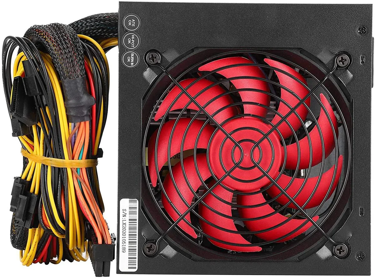 Silver rectangular ATX power supply unit with red 12cm silent fan visible through rear grille