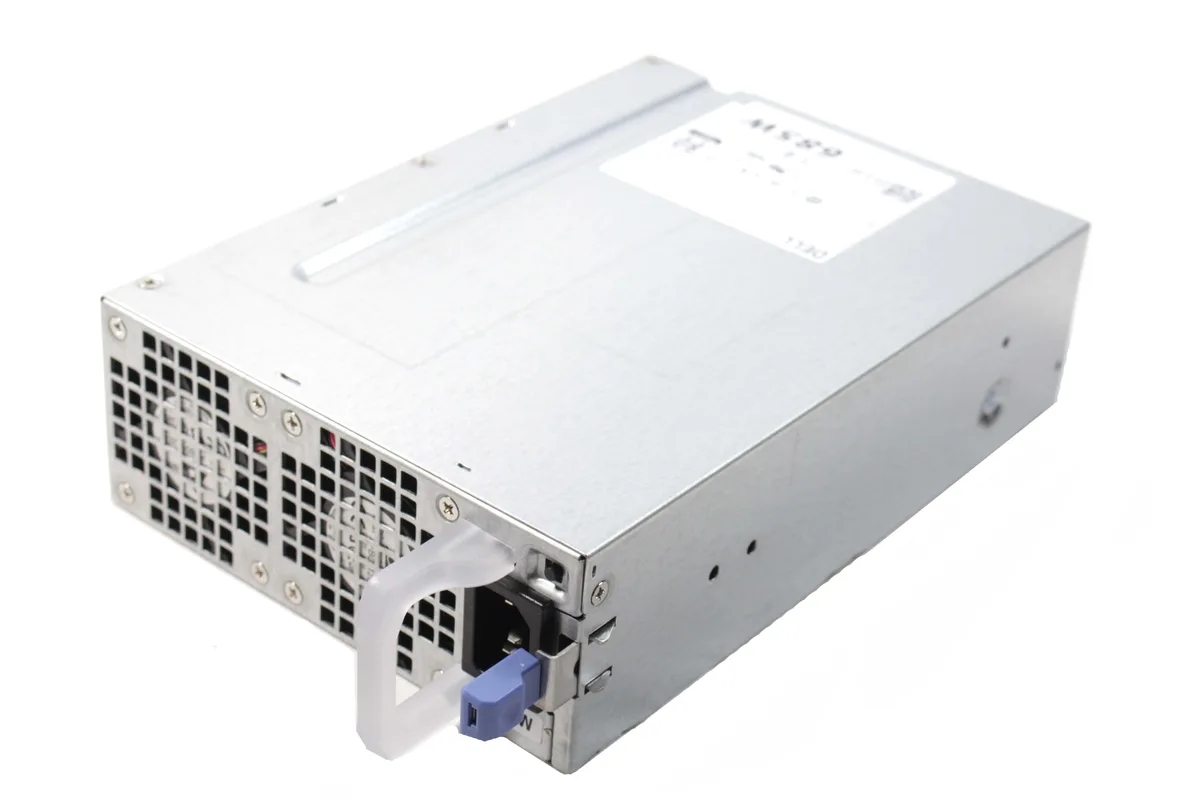 Rectangular silver metal power supply unit with ventilation grille and rear connector panel