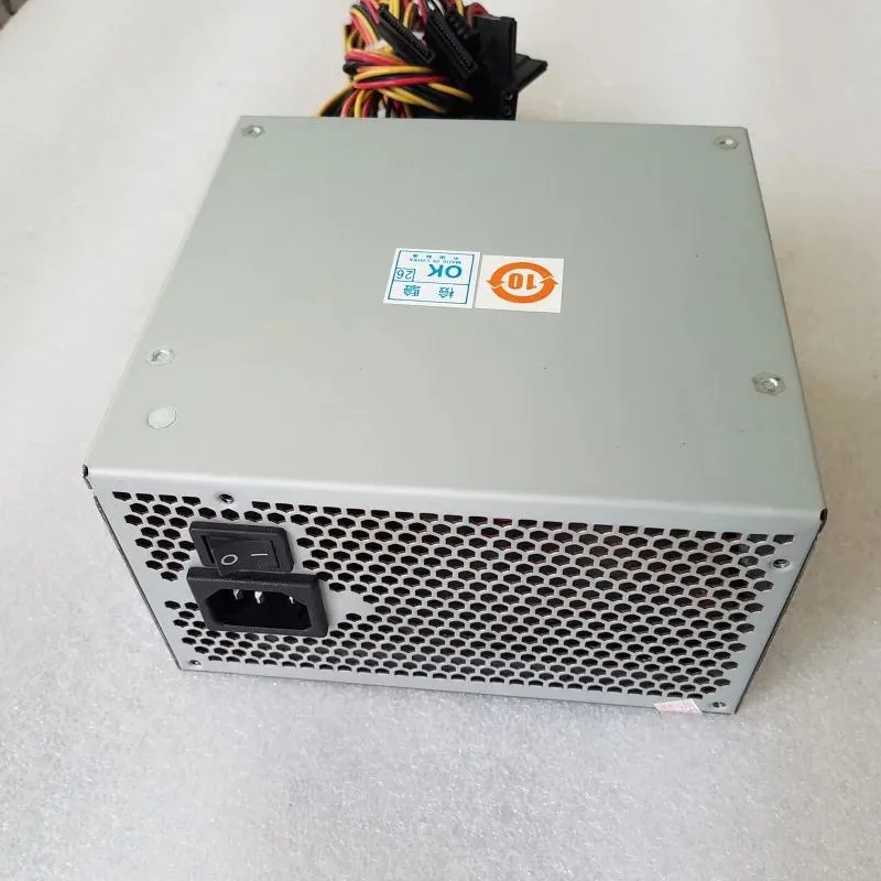 Black rectangular ATX power supply unit with fan grille and power socket