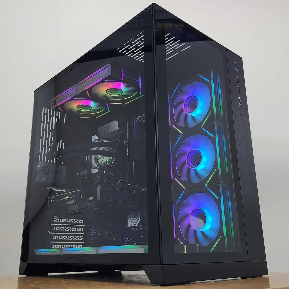 Black Lian Li O11 Dynamic ATX case with 240mm AIO RGB cooler visible through glass side panel