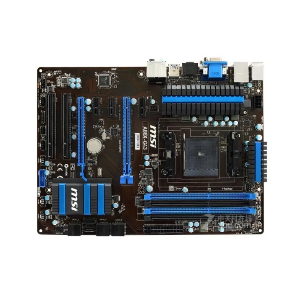 Rectangular ATX motherboard in dark finish with silver heatsinks, black expansion slots and blue memory sockets
