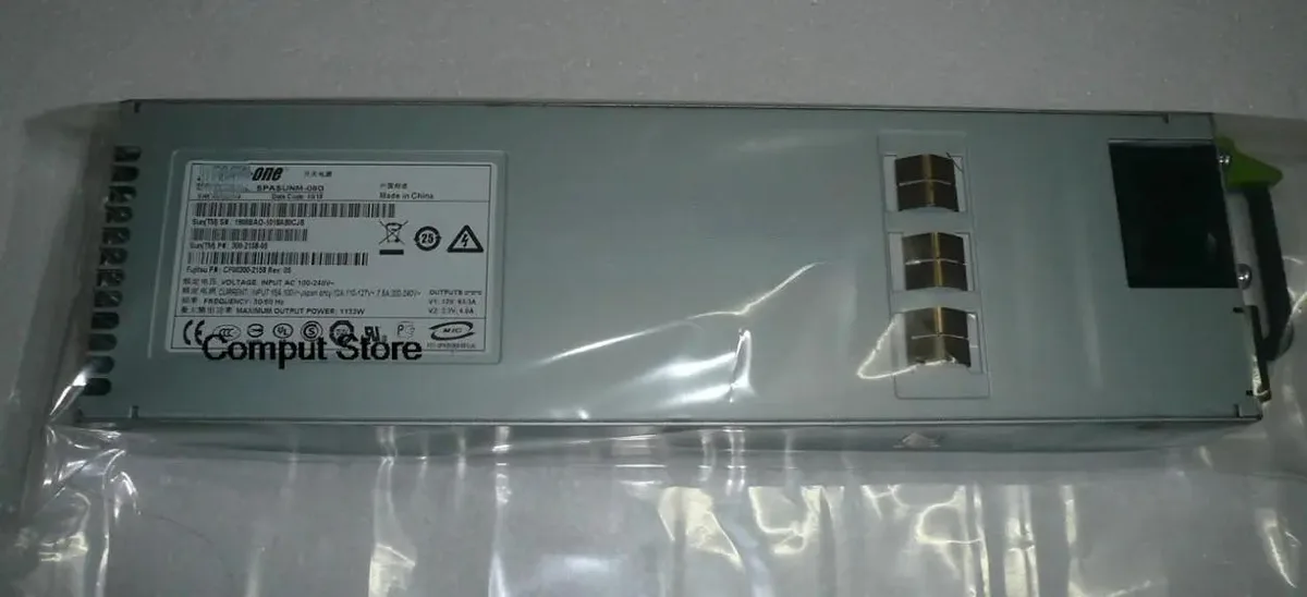 Rectangular metal ATX power supply unit with ventilation grille and label showing 1133W