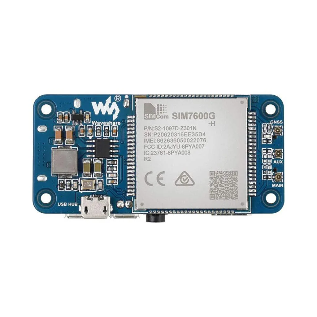 Green rectangular development board with gold pogo pins, micro USB port, SIM card slot, audio jack, USB hub connector, two LEDs