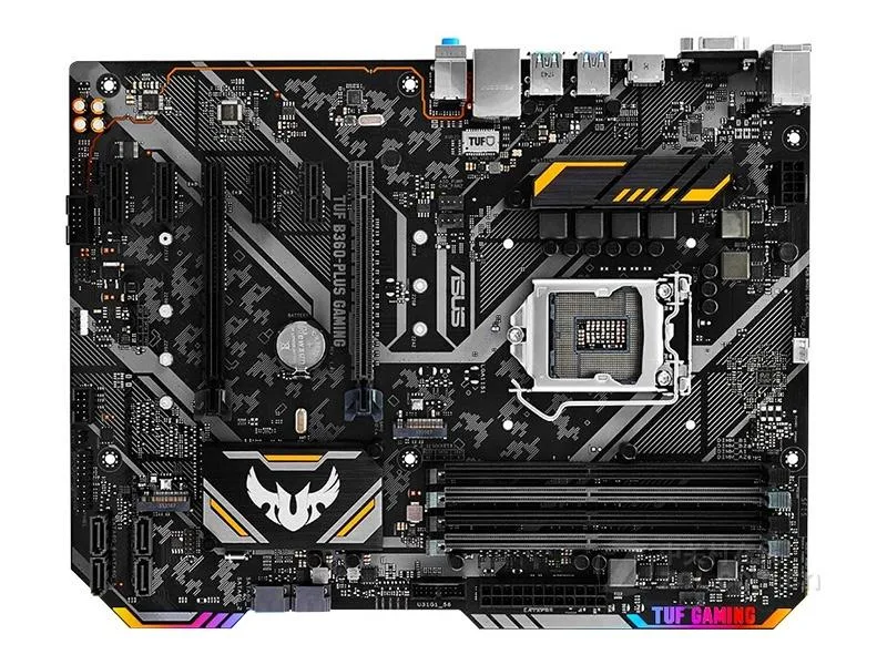 ATX motherboard with black PCB and grey heatsinks