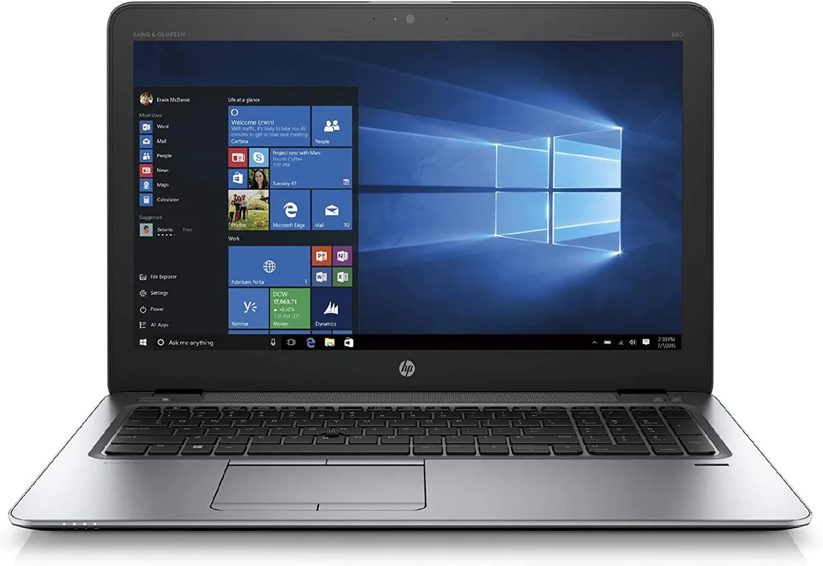 Silver business laptop, 15.6 inch non-touch display, slim profile, keyboard and trackpad visible