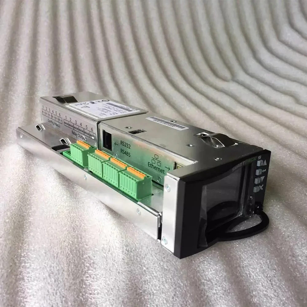 Rectangular ATX power module, matte metal casing, label shows 242100.410 and 10-75V range