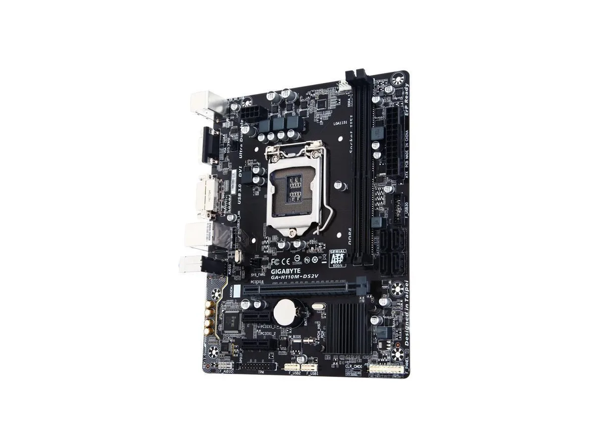 Rectangular green circuit board with silver LGA 1151 socket, two DDR3 slots, DVI-D and D-Sub ports, audio capacitors