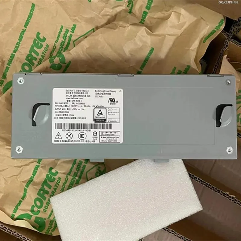 Rectangular silver ATX power supply unit with fan grille and modular cable sockets