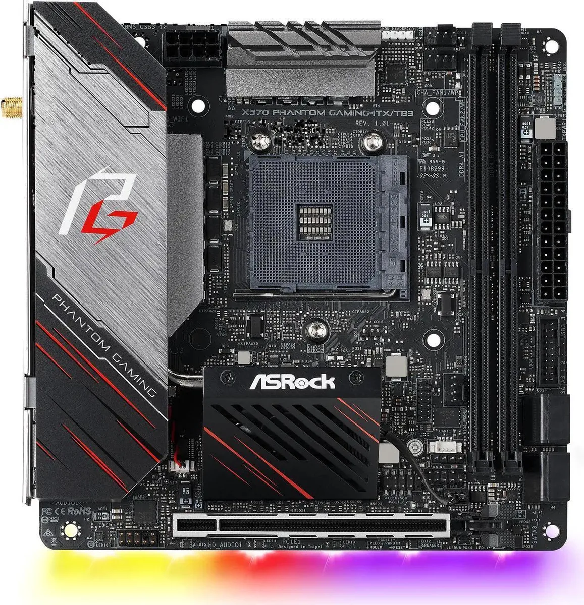 Compact Mini-ITX motherboard, black PCB with silver heatsinks and rear I/O shield