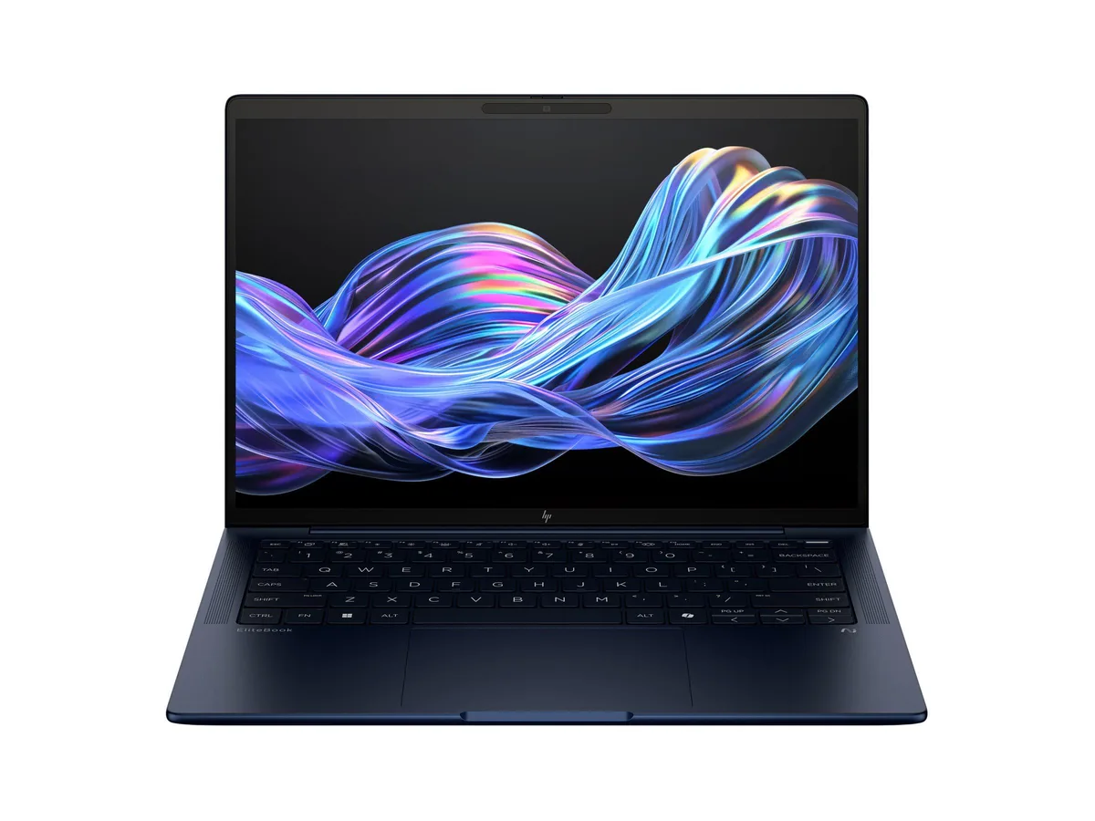 Silver 14 inch laptop closed on plain background