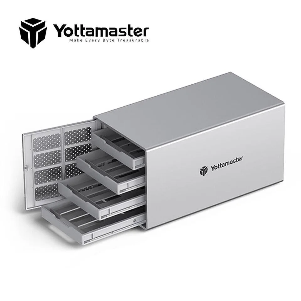 Silver aluminium four-bay desktop enclosure with front drive trays and a built-in fan