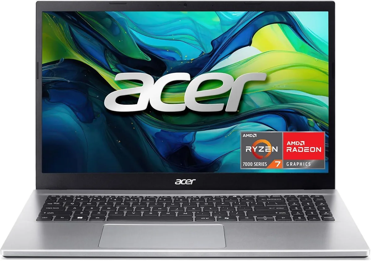 Silver 15.6 inch laptop with standard keyboard and webcam