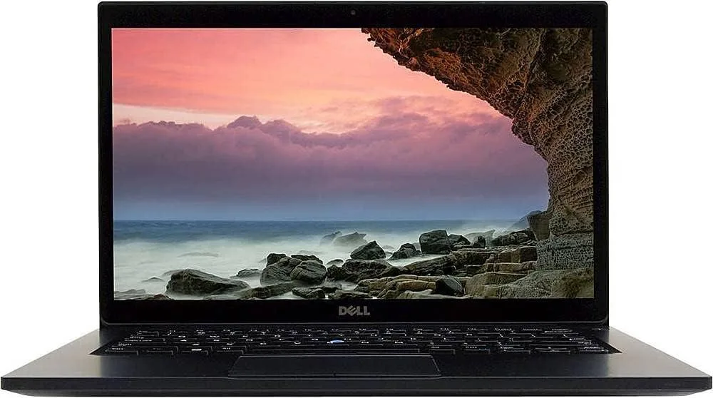 Silver Dell Latitude 7480 laptop closed on a desk