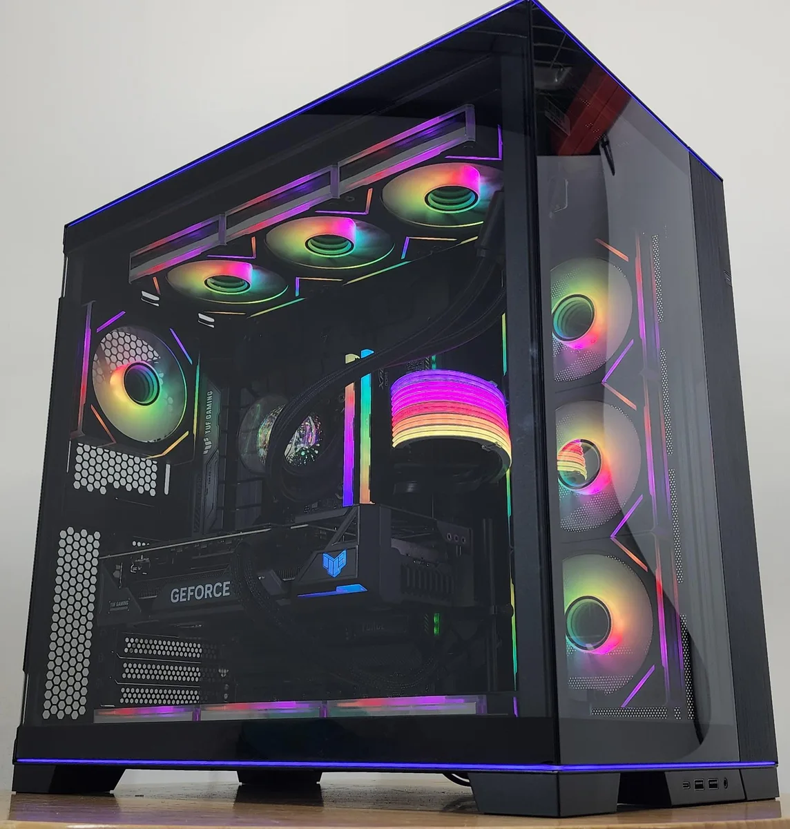 White Lian Li O11 Dynamic EVO RGB tower with glass side panels and 360mm AIO RGB cooler visible inside