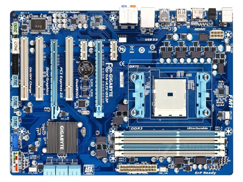 Rectangular ATX motherboard with black PCB, silver heatsinks, four DDR3 slots and rear I/O panel