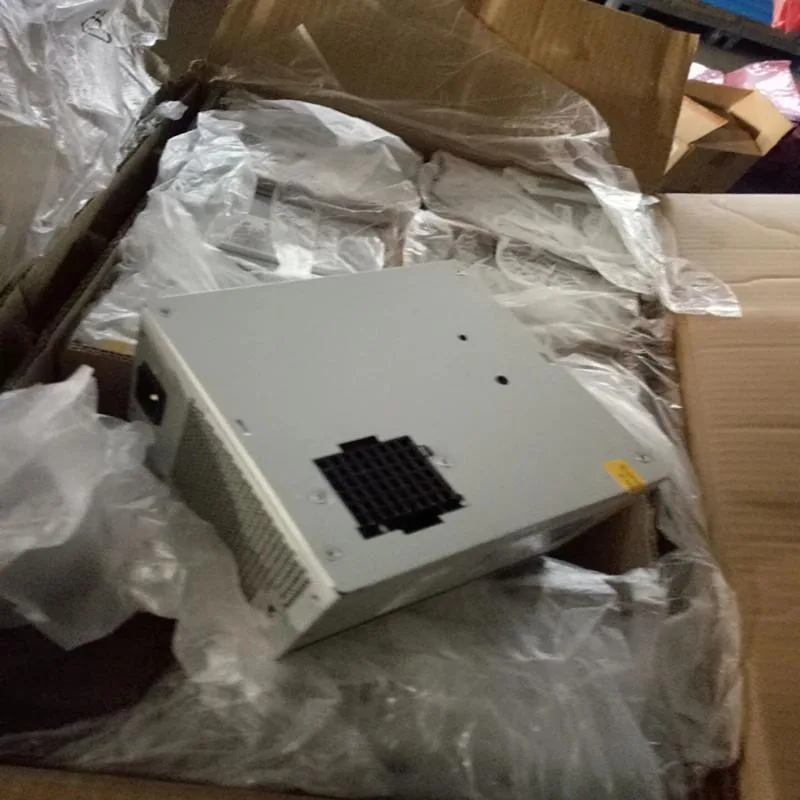 Rectangular ATX power supply unit with matte black metal casing and rear exhaust grille
