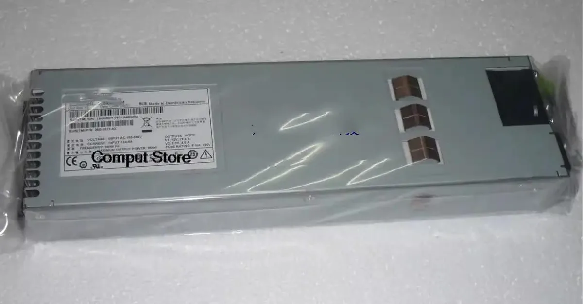 Rectangular silver server power supply unit with rear fan grille and power socket