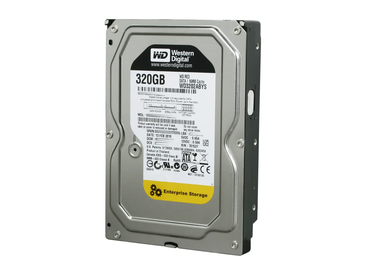 Silver 3.5 inch bare hard drive with green circuit board visible