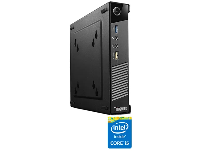 Small black desktop tower with wired keyboard and mouse