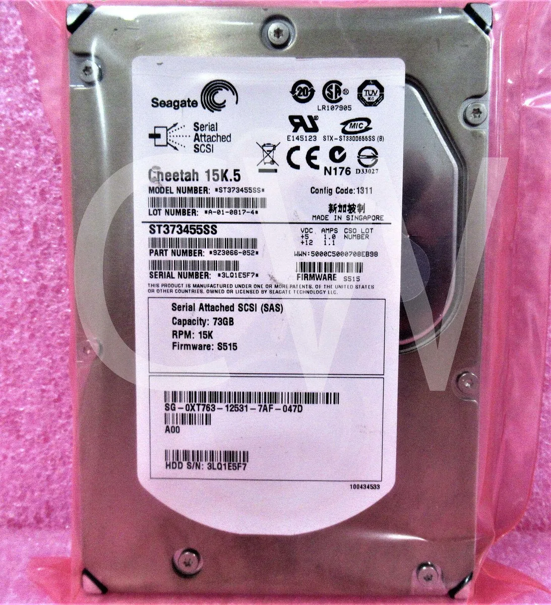 Silver 3.5 inch SAS hard drive with green circuit board visible